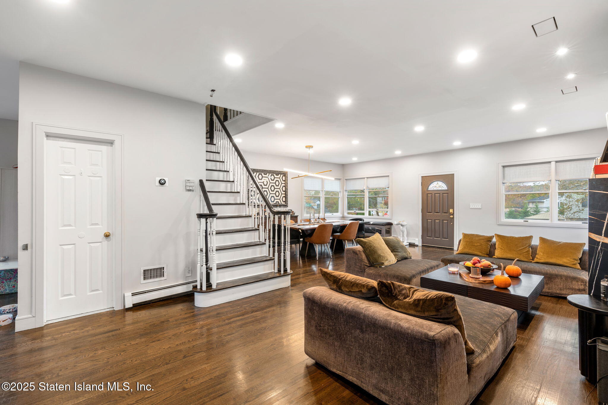 6 Mosely Avenue Staten Island, NY 10312 - Photo 9 of 55 a living room with furniture and wooden floor