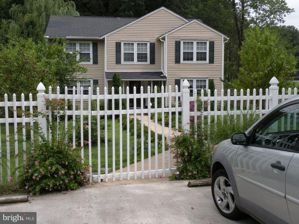 14731 Good Hope Road Silver Spring, MD 20905 - Photo 2 of 30 a car parked in front of a house