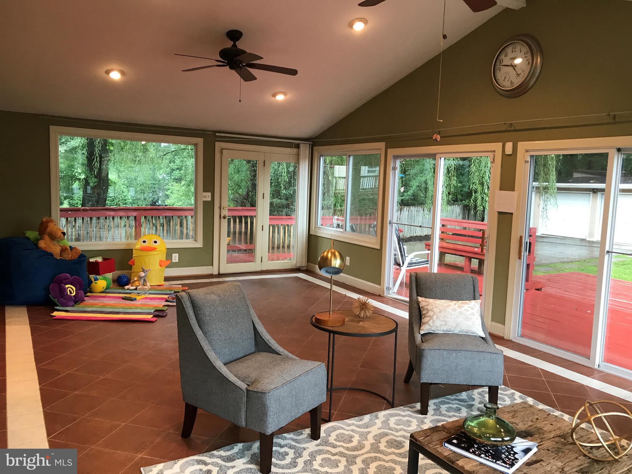 14731 Good Hope Road Silver Spring, MD 20905 - Photo 12 of 30 a dining room with furniture and a large window