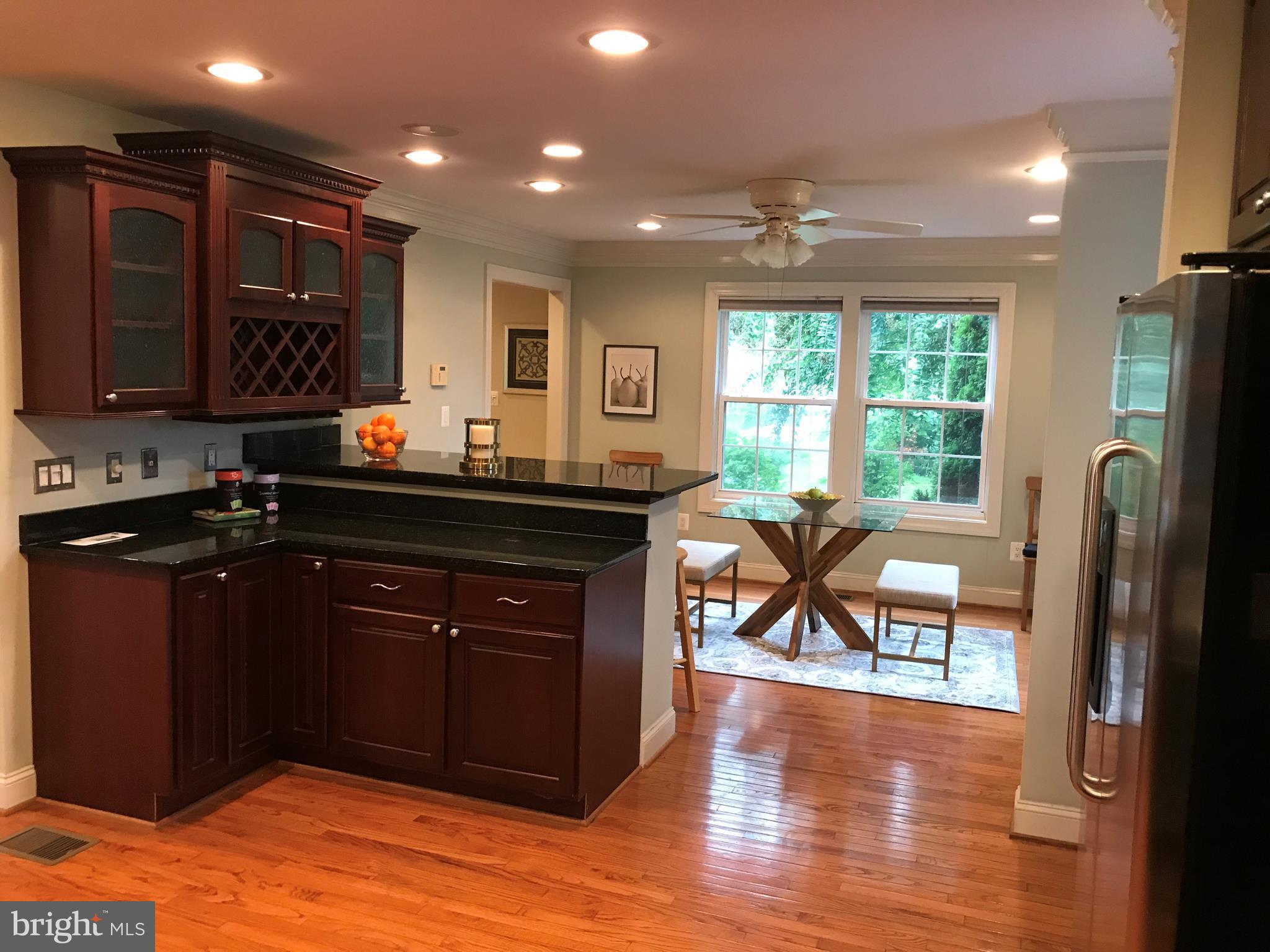 14731 Good Hope Road Silver Spring, MD 20905 - Photo 18 of 30 a kitchen with a sink appliances and cabinets