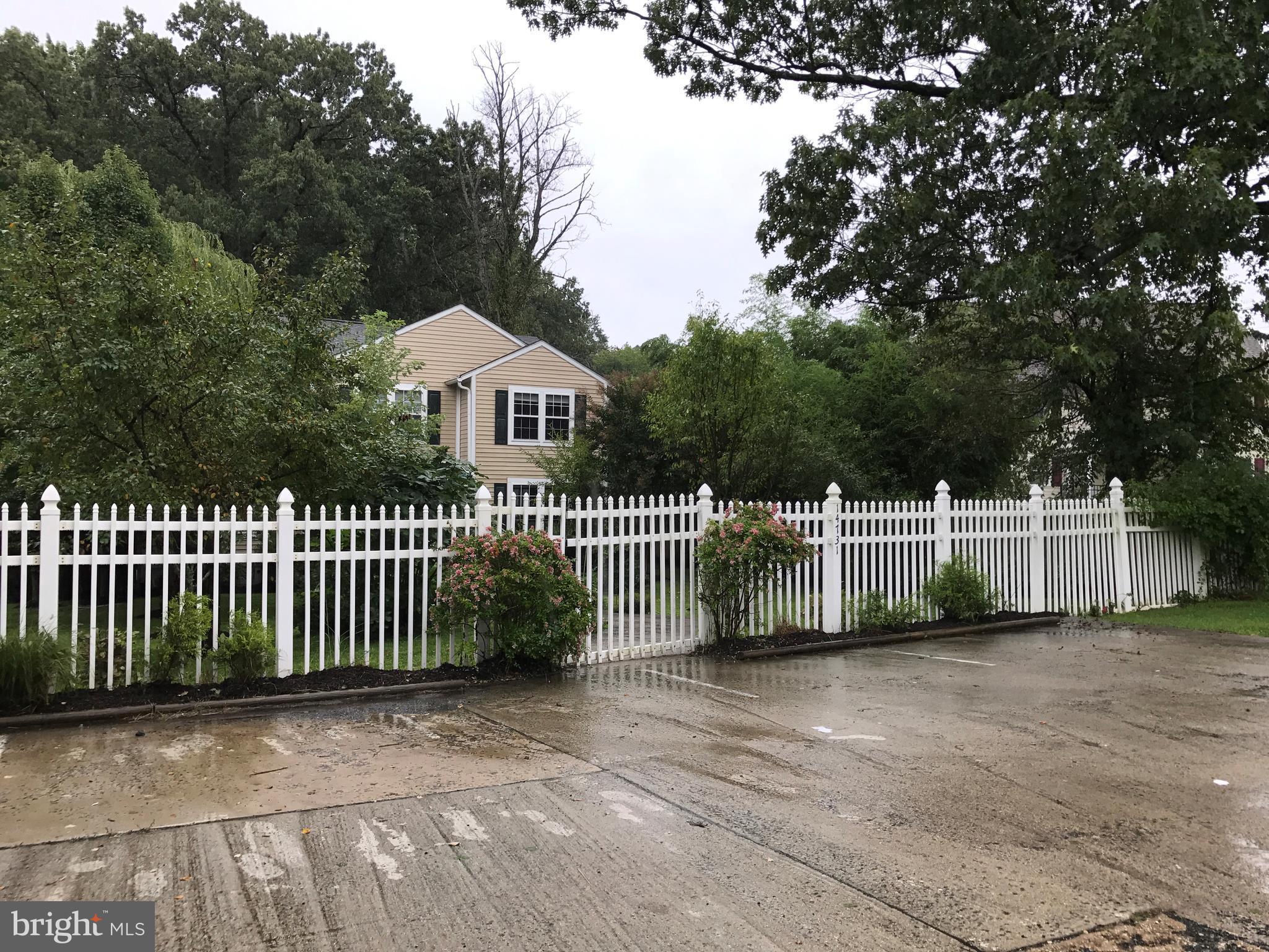 14731 Good Hope Road Silver Spring, MD 20905 - Photo 3 of 30 a front view of a house with a garden