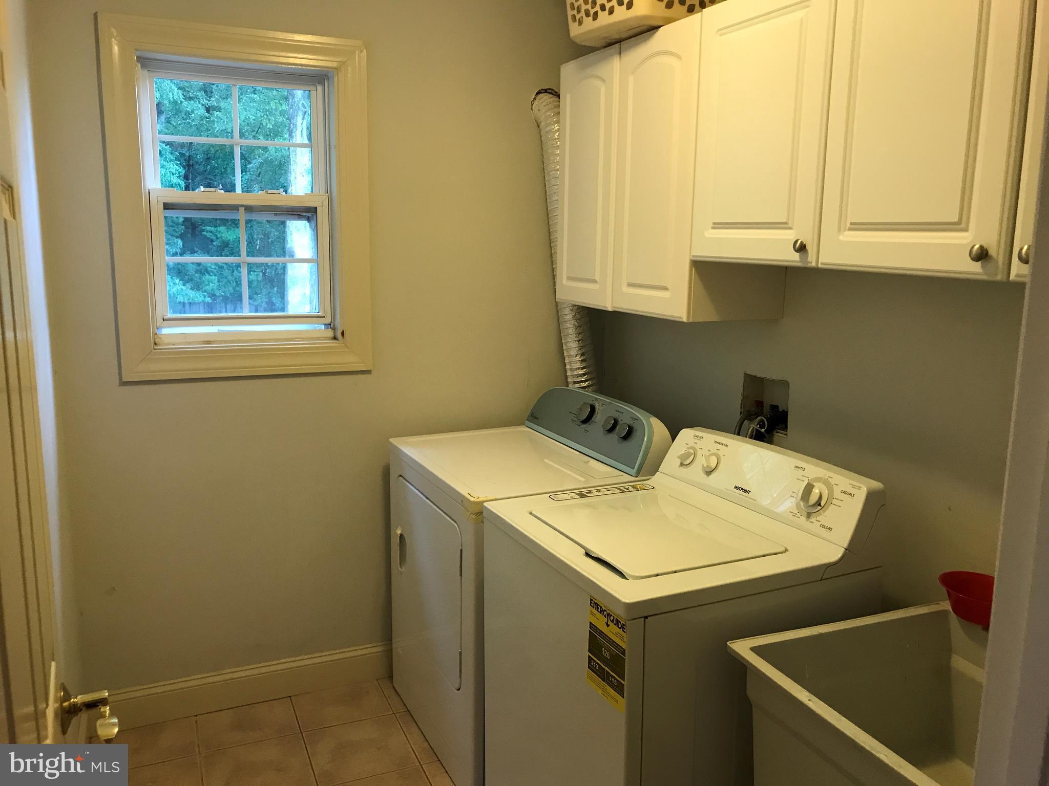 14731 Good Hope Road Silver Spring, MD 20905 - Photo 23 of 30 a utility room with dryer and washer