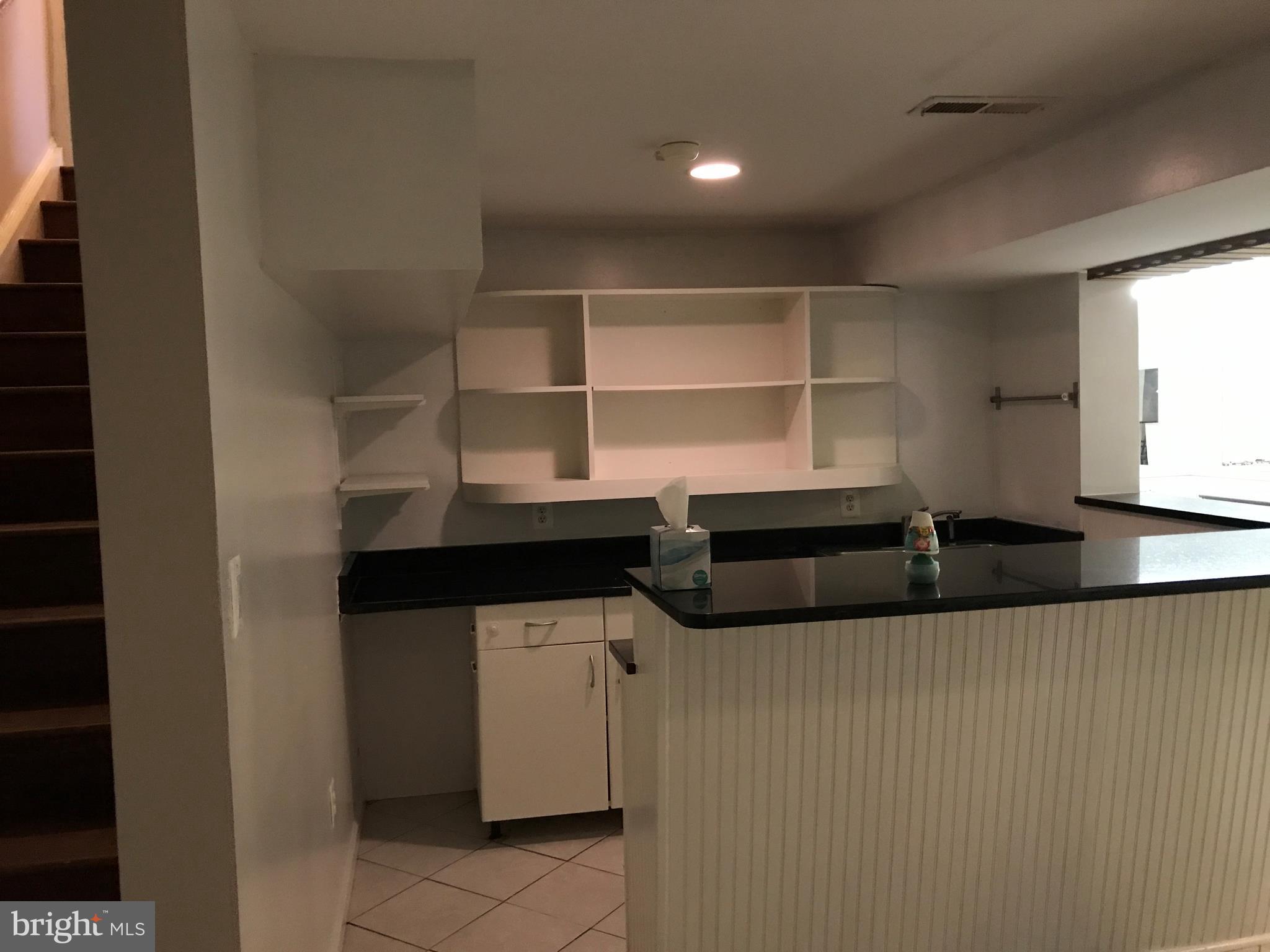 14731 Good Hope Road Silver Spring, MD 20905 - Photo 28 of 30 a room with storage and utility