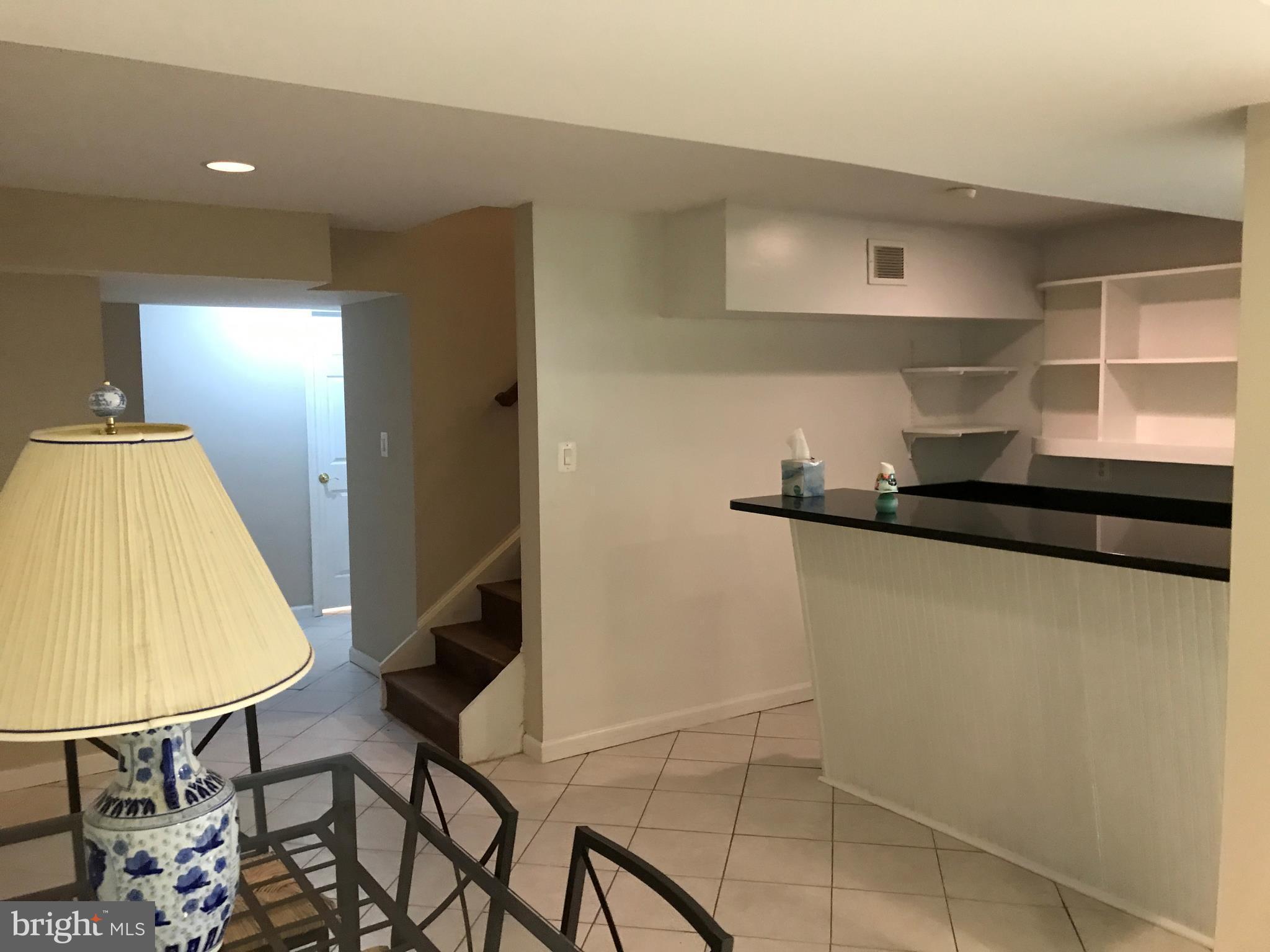 14731 Good Hope Road Silver Spring, MD 20905 - Photo 29 of 30 a room with chairs and table
