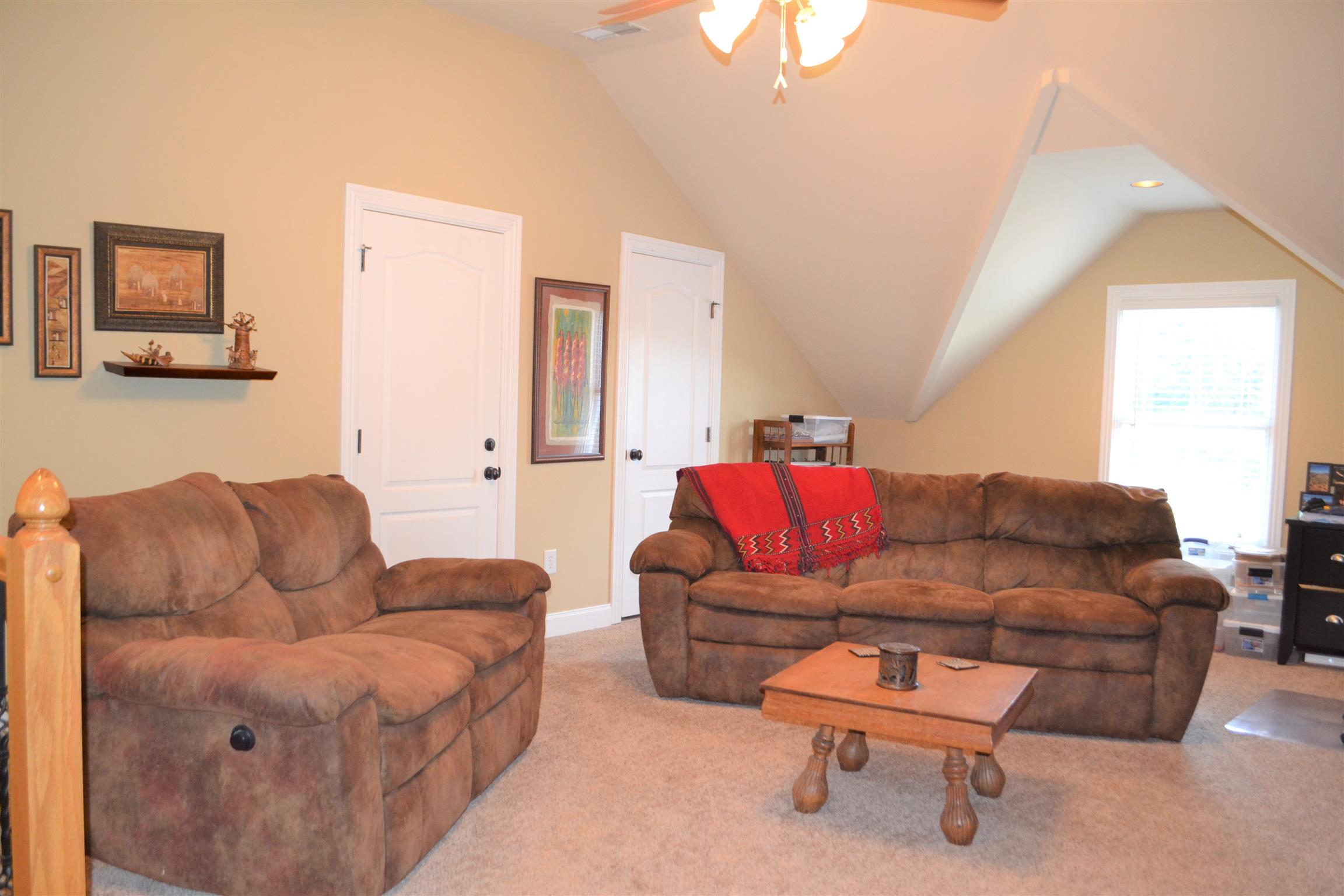 730 Walnut Grove Road Lebanon, TN 37090 - Photo 14 of 29 VAULTED CEILING IN 20X24 BONUS ROOM OVER GARAGE; BUILT IN CABINETS; LOTS OF ATTIC STORAGE