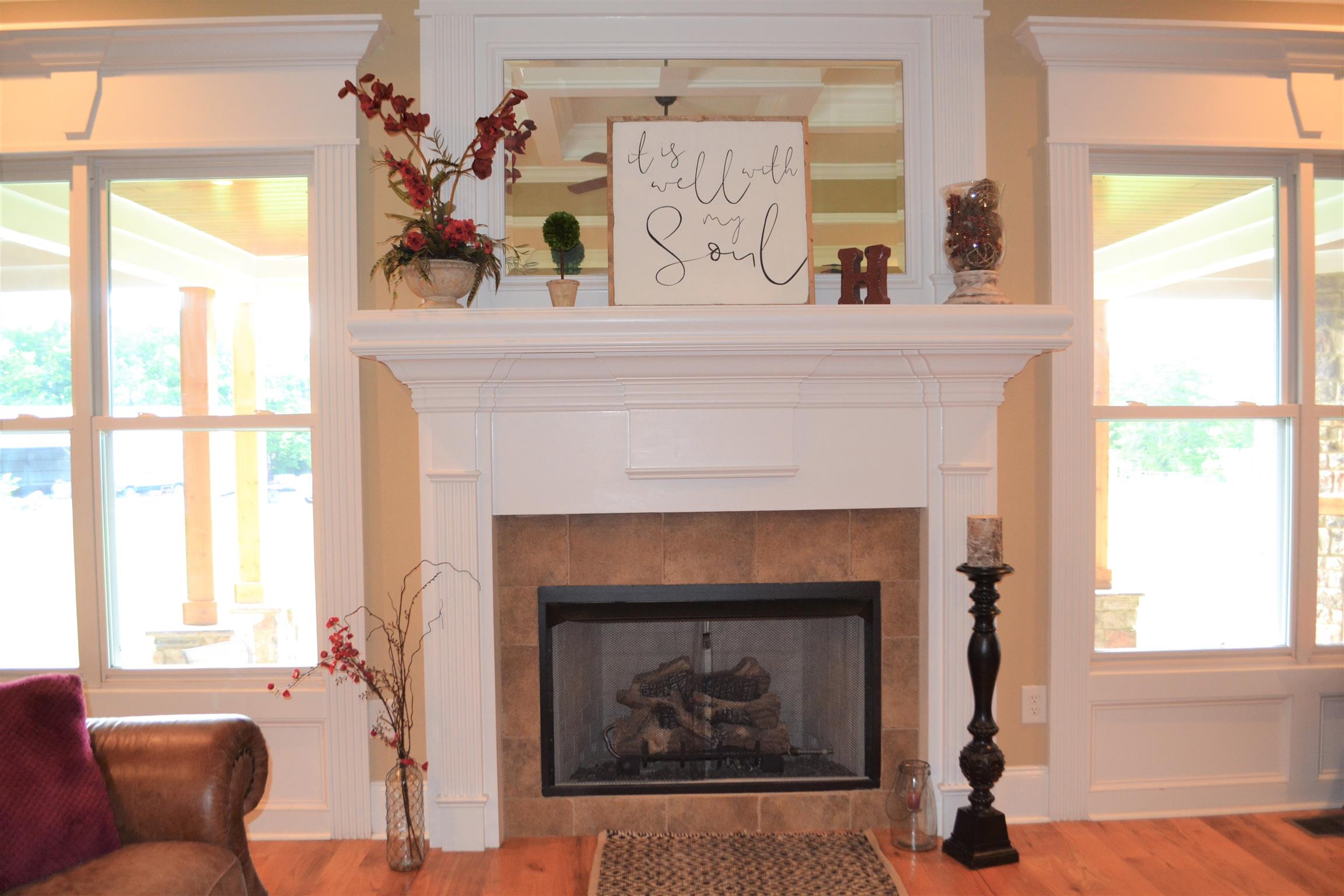 730 Walnut Grove Road Lebanon, TN 37090 - Photo 18 of 29 BEAUTIFUL CUSTOM MANTLE GAS FIREPLACE IN THE LIVING ROOM; LOTS OF LIGHT FROM TALL WINDOWS THROUGHOUT THE HOUSE