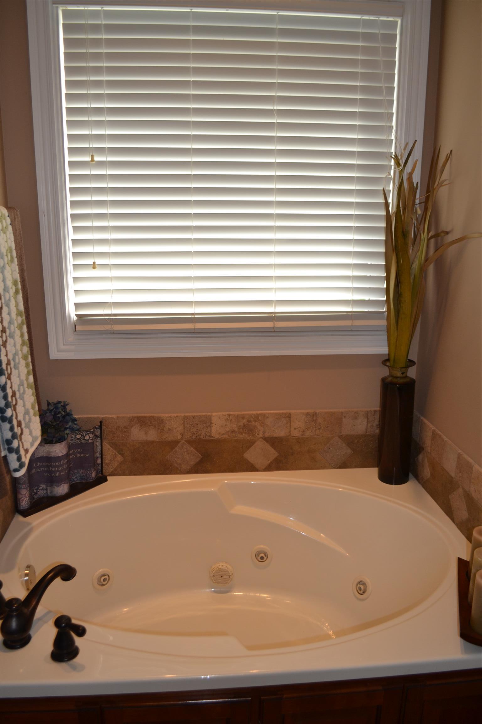 730 Walnut Grove Road Lebanon, TN 37090 - Photo 24 of 29 MASTER BATH HAS JACUZZI TUB WITH TILE SURROUND;