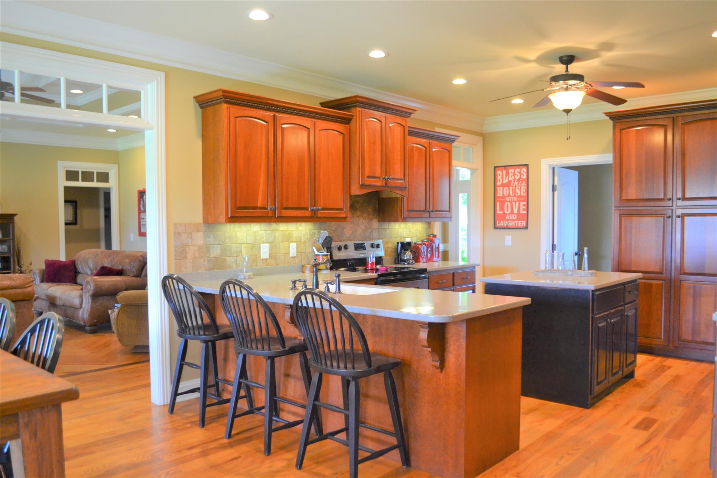 730 Walnut Grove Road Lebanon, TN 37090 - Photo 7 of 29 KITCHEN HAS CORIAN TOPS WITH BAR STOOLS