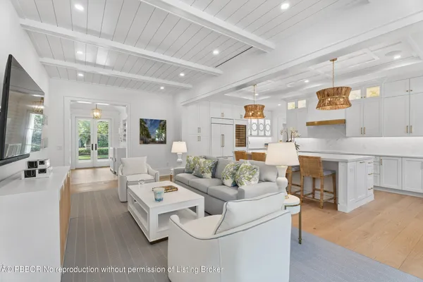 a living room with furniture and a table
