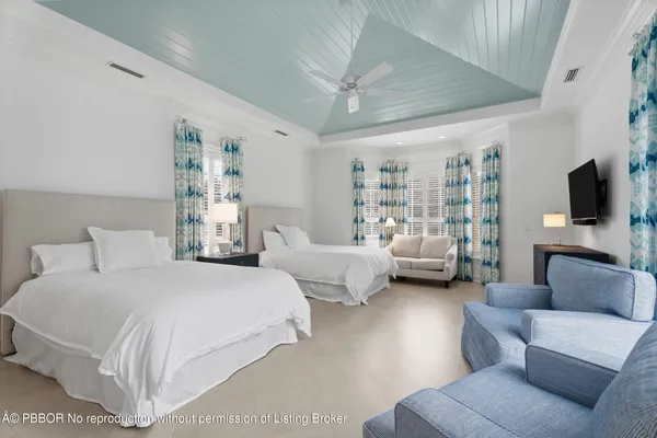 a bedroom with furniture and a couch