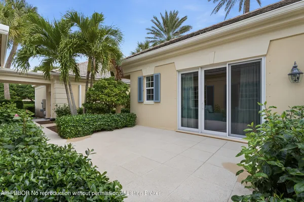 front view of a house with a garden
