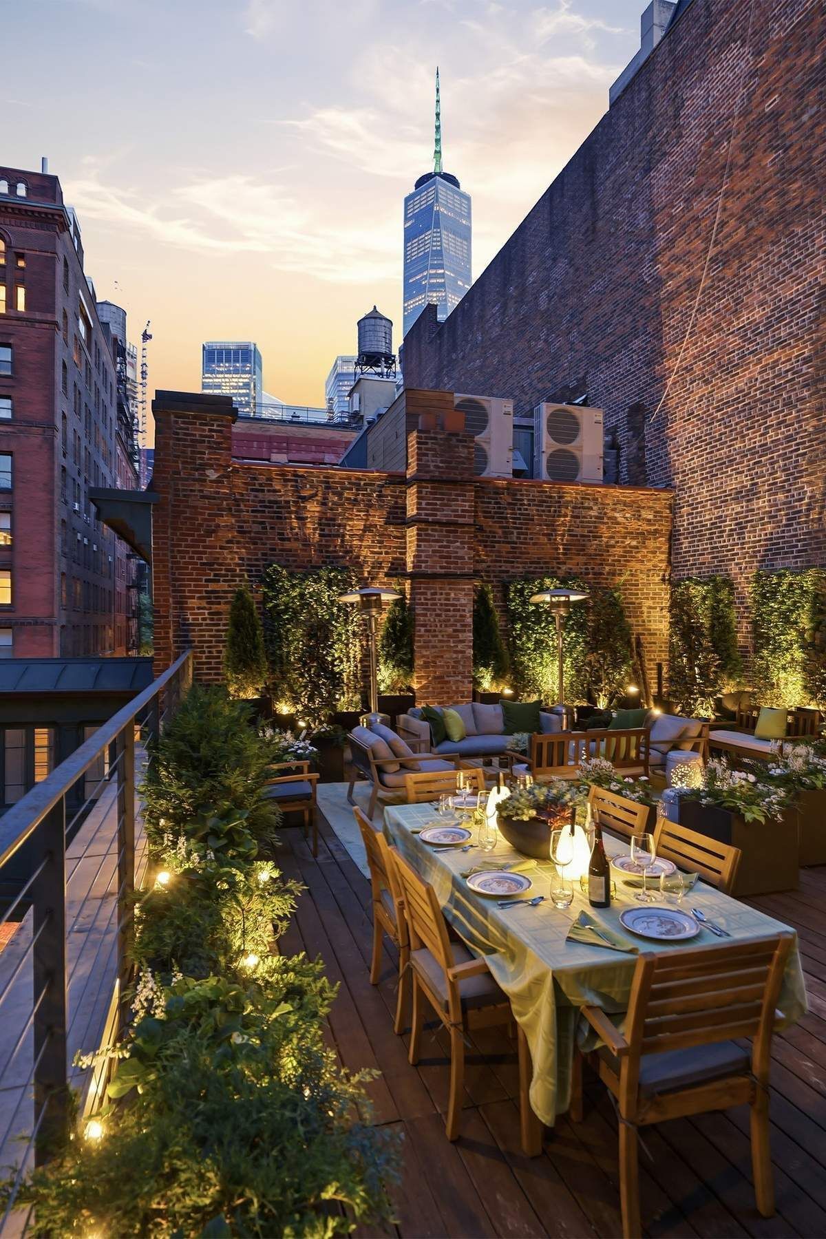 4 Staple Street Manhattan, NY 10013 - Photo 4 of 29 a view of a patio with table and chairs and potted plants