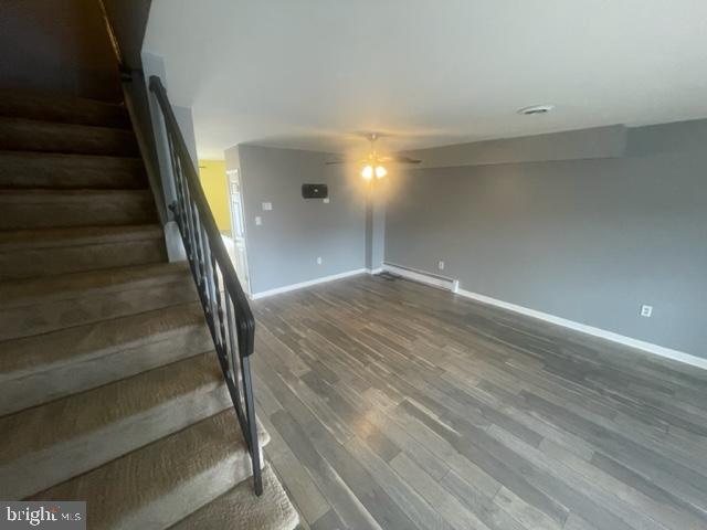 3608 Walnut Ridge Drive Pottstown, PA 19464 - Photo 5 of 28 an empty room with wooden floor and windows