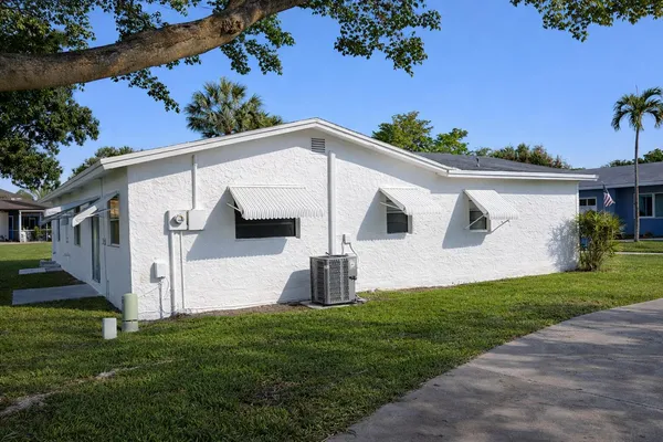 a view of a back yard of the house
