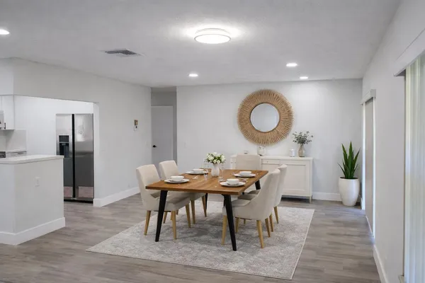 a view of a dining room with furniture
