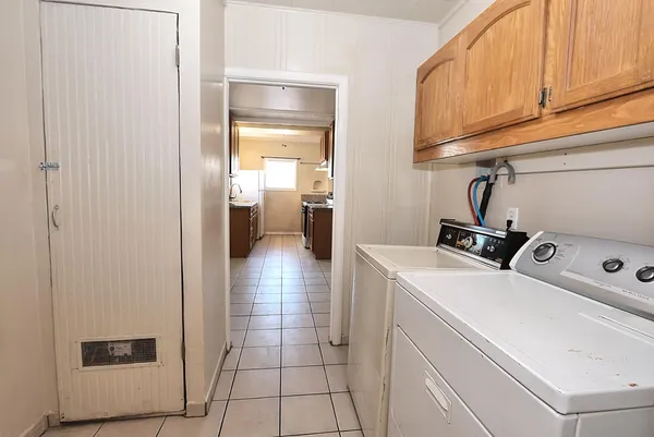 a bathroom with a toilet a sink and a shower