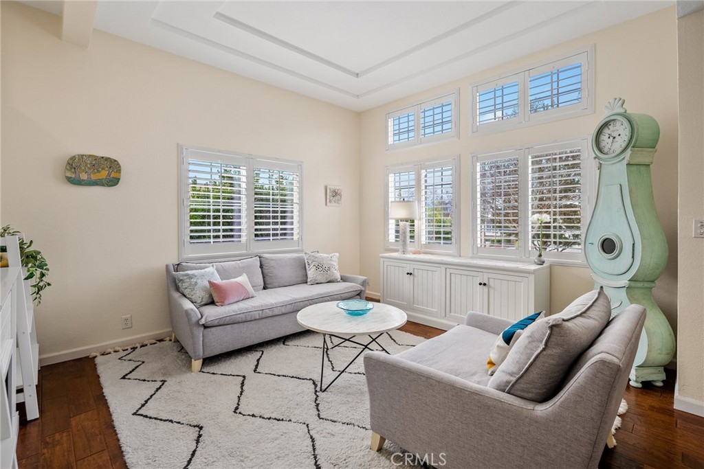 378 Lark Drive Paso Robles, CA 93446 - Photo 12 of 33 a living room with furniture two window and a table