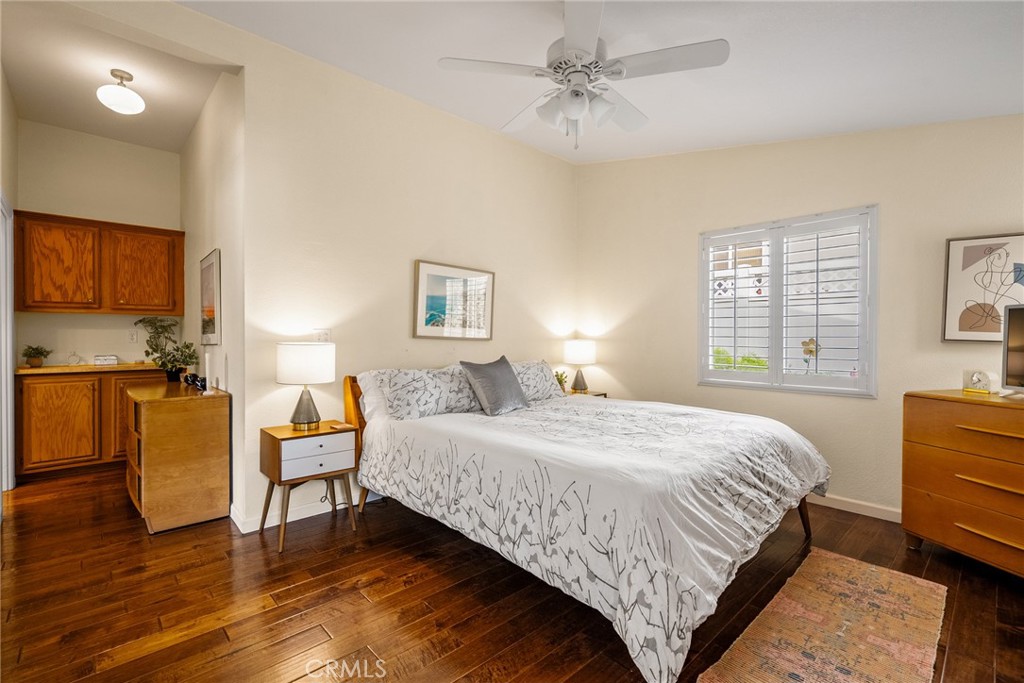 378 Lark Drive Paso Robles, CA 93446 - Photo 14 of 33 a bedroom with a bed and wooden floor