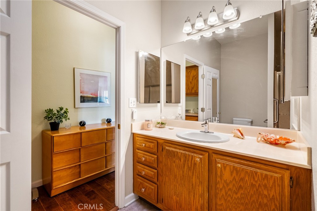 378 Lark Drive Paso Robles, CA 93446 - Photo 17 of 33 a bathroom with a double vanity sink and a mirror