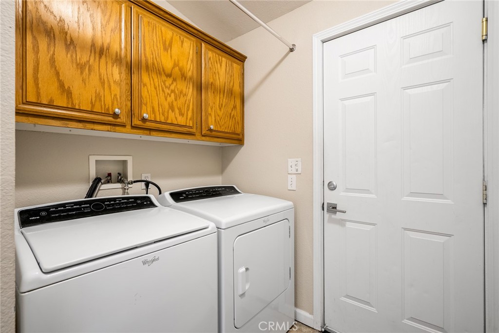 378 Lark Drive Paso Robles, CA 93446 - Photo 21 of 33 a utility room with dryer and washer
