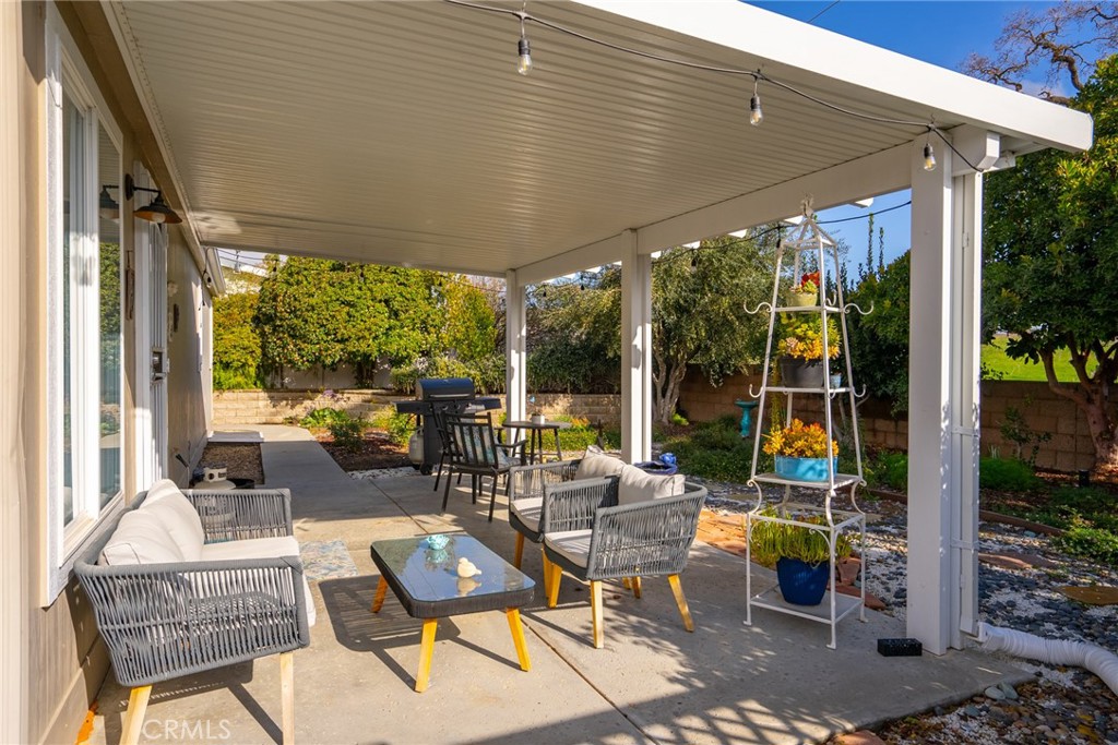 378 Lark Drive Paso Robles, CA 93446 - Photo 27 of 33 a outdoor space with patio the couches and a dining table with the garden view
