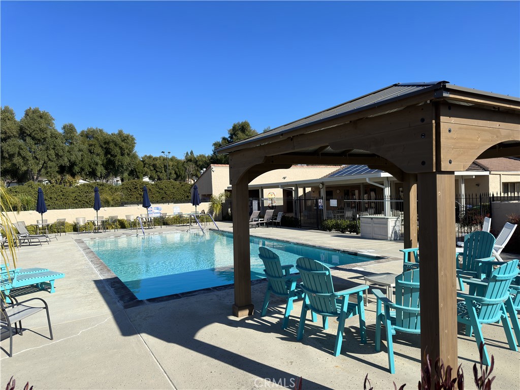 378 Lark Drive Paso Robles, CA 93446 - Photo 33 of 33 a view of swimming pool with seating area and hardwood floor