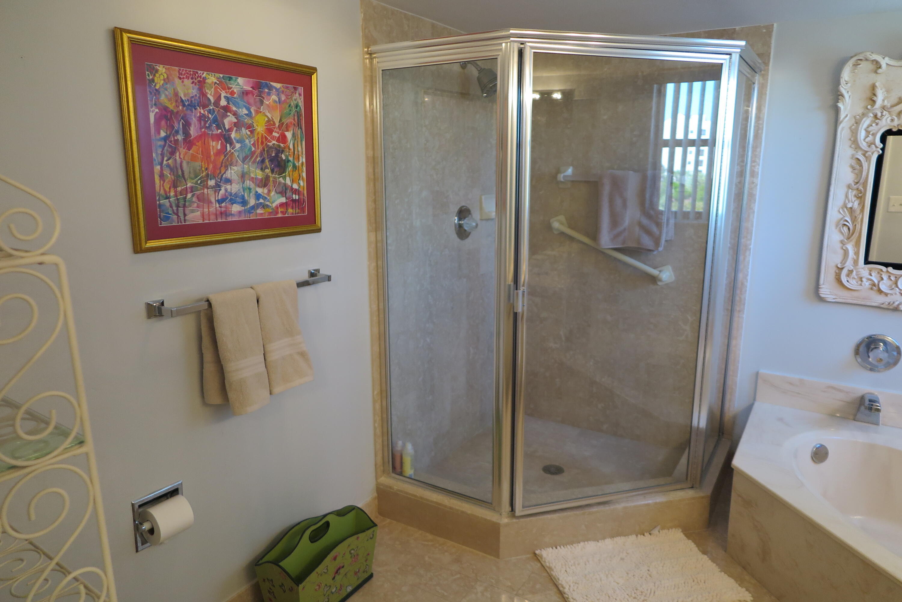 7578 Regency Lake Drive, Unit 501 Boca Raton, FL 33433 - Photo 18 of 32 a bathroom with a shower and a sink