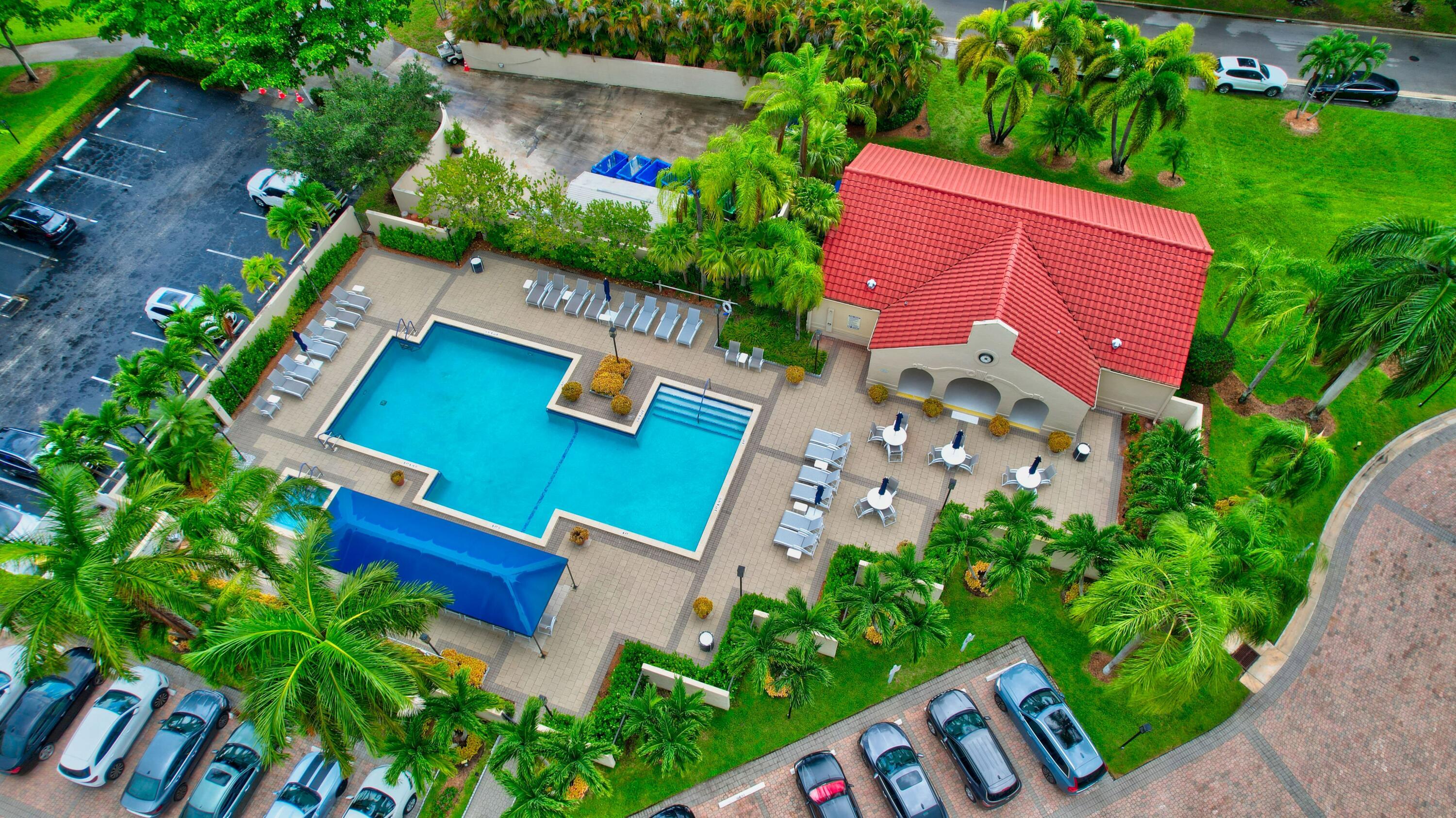 7578 Regency Lake Drive, Unit 501 Boca Raton, FL 33433 - Photo 29 of 32 an aerial view of a house