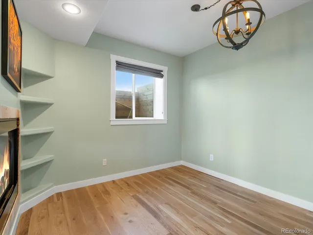 a kitchen with a stove and a window