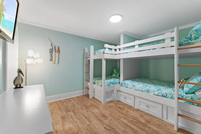 a bedroom with furniture and window