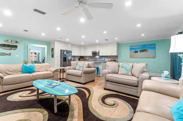 a living room with furniture and a table