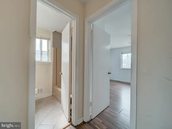 a view of a bathroom from the hallway