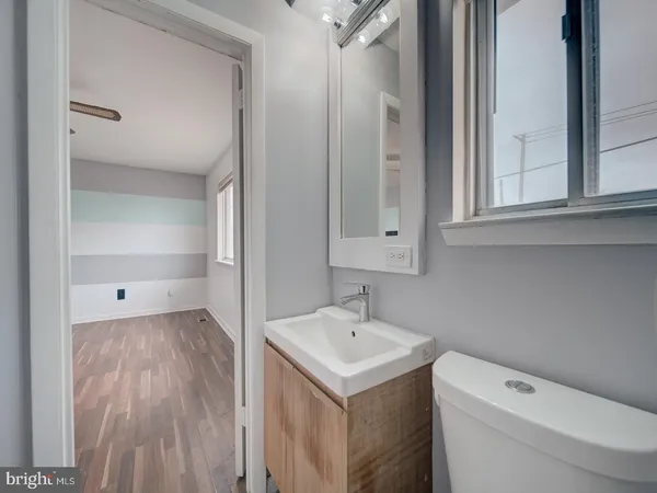 a bathroom with a sink and a toilet