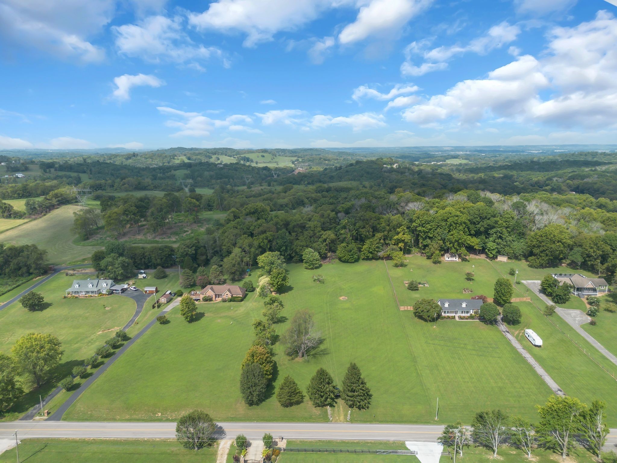 1863 Clara Mathis Road Spring Hill, TN 37174 - Photo 14 of 14 a view of a lake with a houses