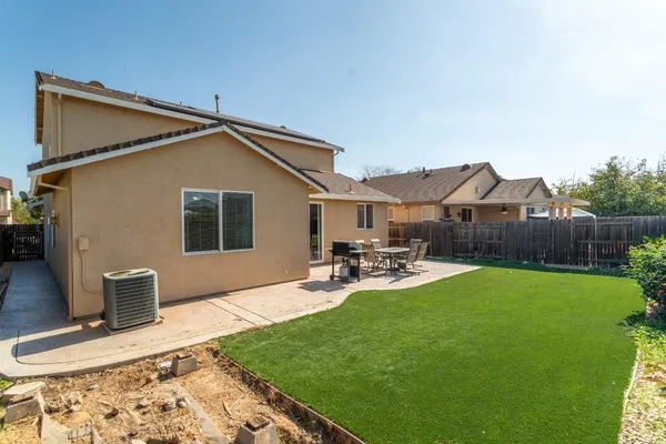 a garden view with a seating space