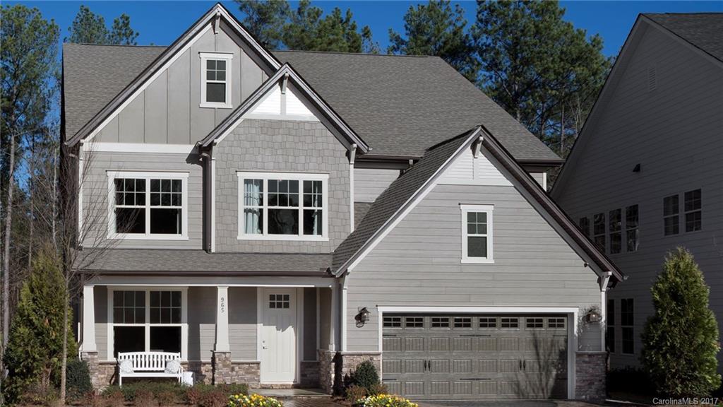 1046 Emory Lane, Unit 77 Fort Mill, SC 29708 - Photo 1 of 1 a view of a house with a yard and potted plants