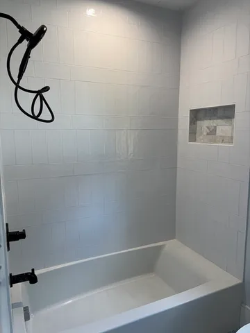 a bathroom with a bathtub