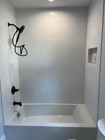 a bathroom with a bathtub