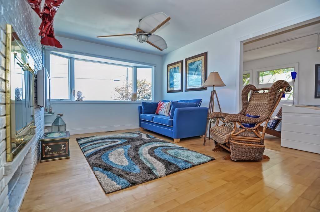 56 Marmion Way Rockport, MA 01966 - Photo 13 of 30 a living room with furniture