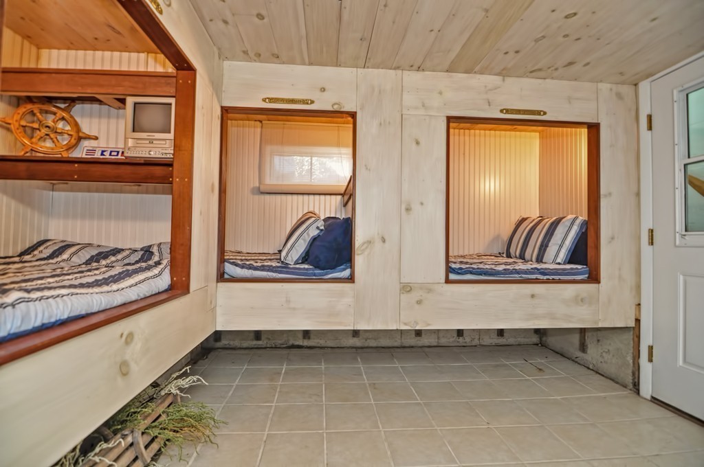 56 Marmion Way Rockport, MA 01966 - Photo 21 of 30 a view of a back door of the house