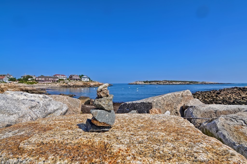 56 Marmion Way Rockport, MA 01966 - Photo 30 of 30 a view of a lake with a mountain