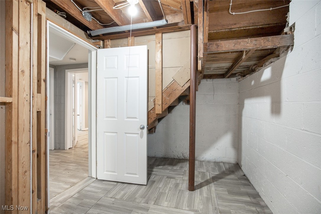 12328 Granger Road Cleveland, OH 44125 - Photo 30 of 37 Unfinished below grade area with light flooring