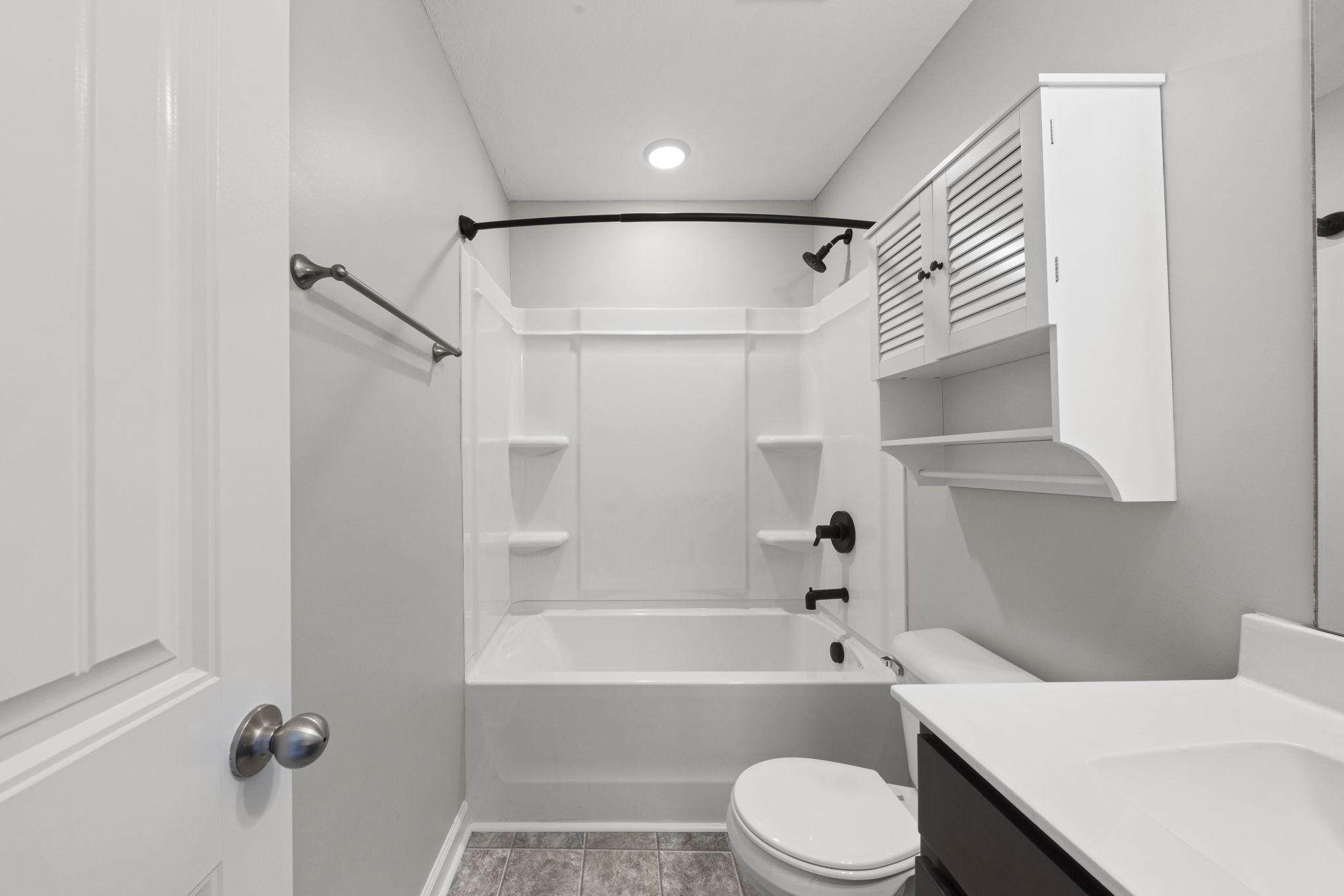 119 Davis Ridge Lane Clarksville, TN 37040 - Photo 25 of 30 a bathroom with a bathtub shower sink vanity and toilet