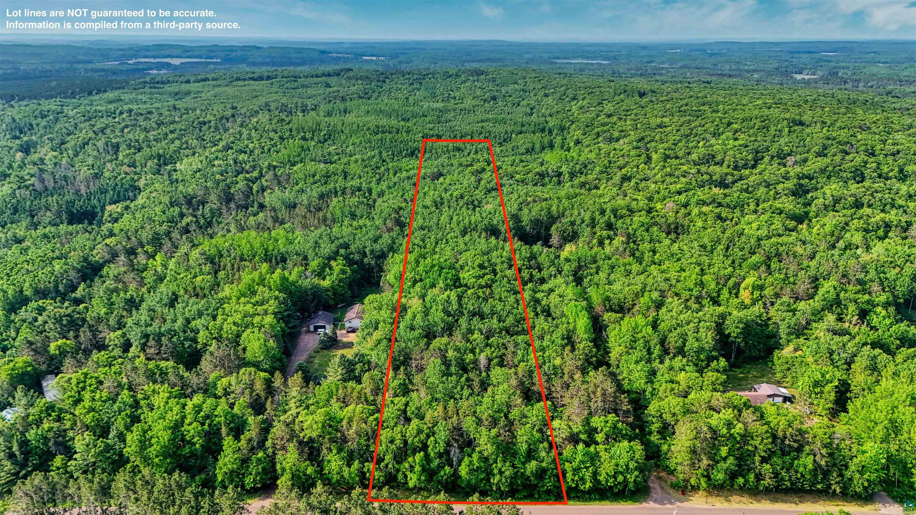 Aerial view of property and surrounding area featuring property boundaries highlighted