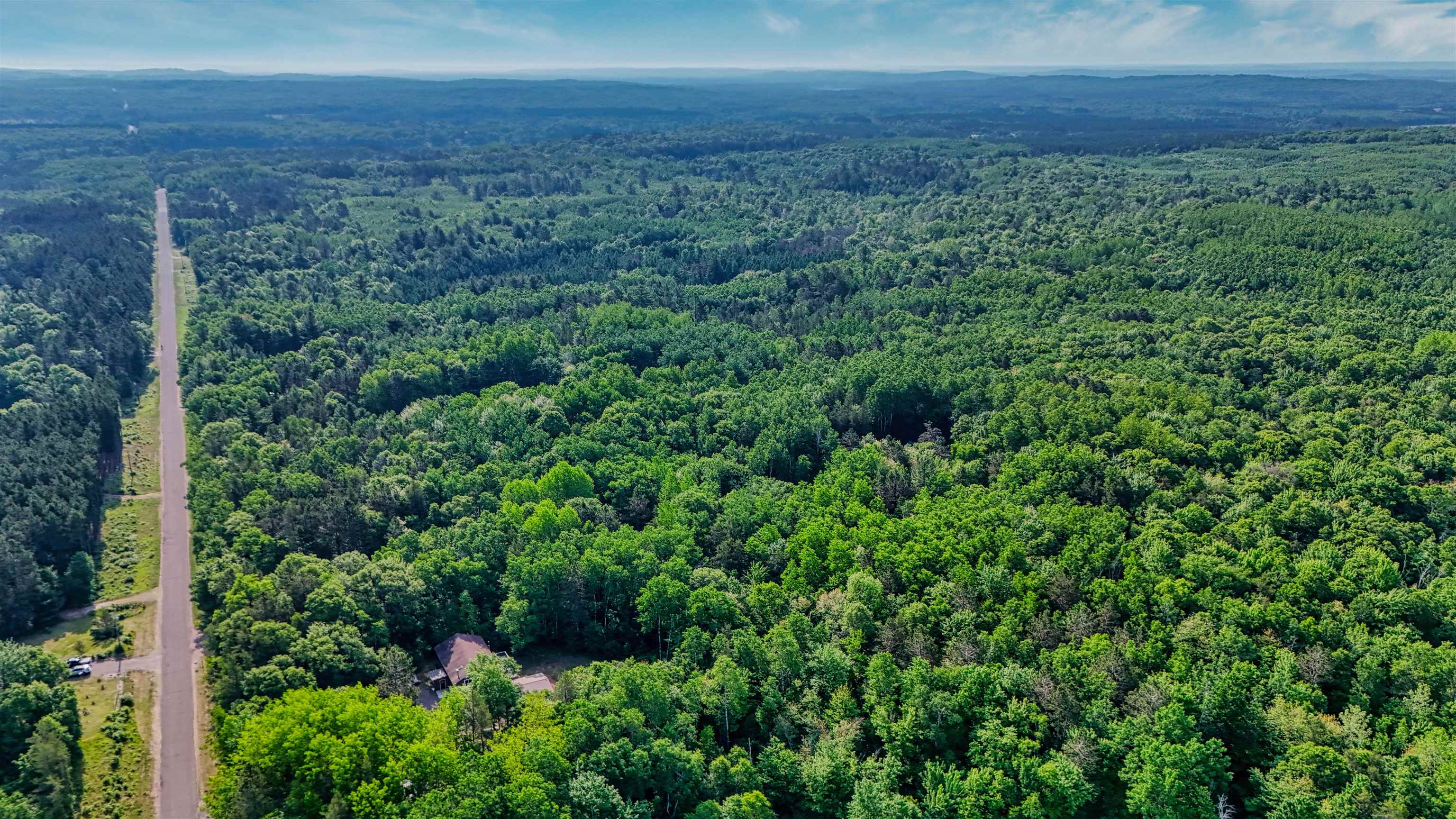 5-acres On Spring Lake Road Trego, WI 54888 - Photo 5 of 16 Aerial view of property's location with a forest and property parcel outlined