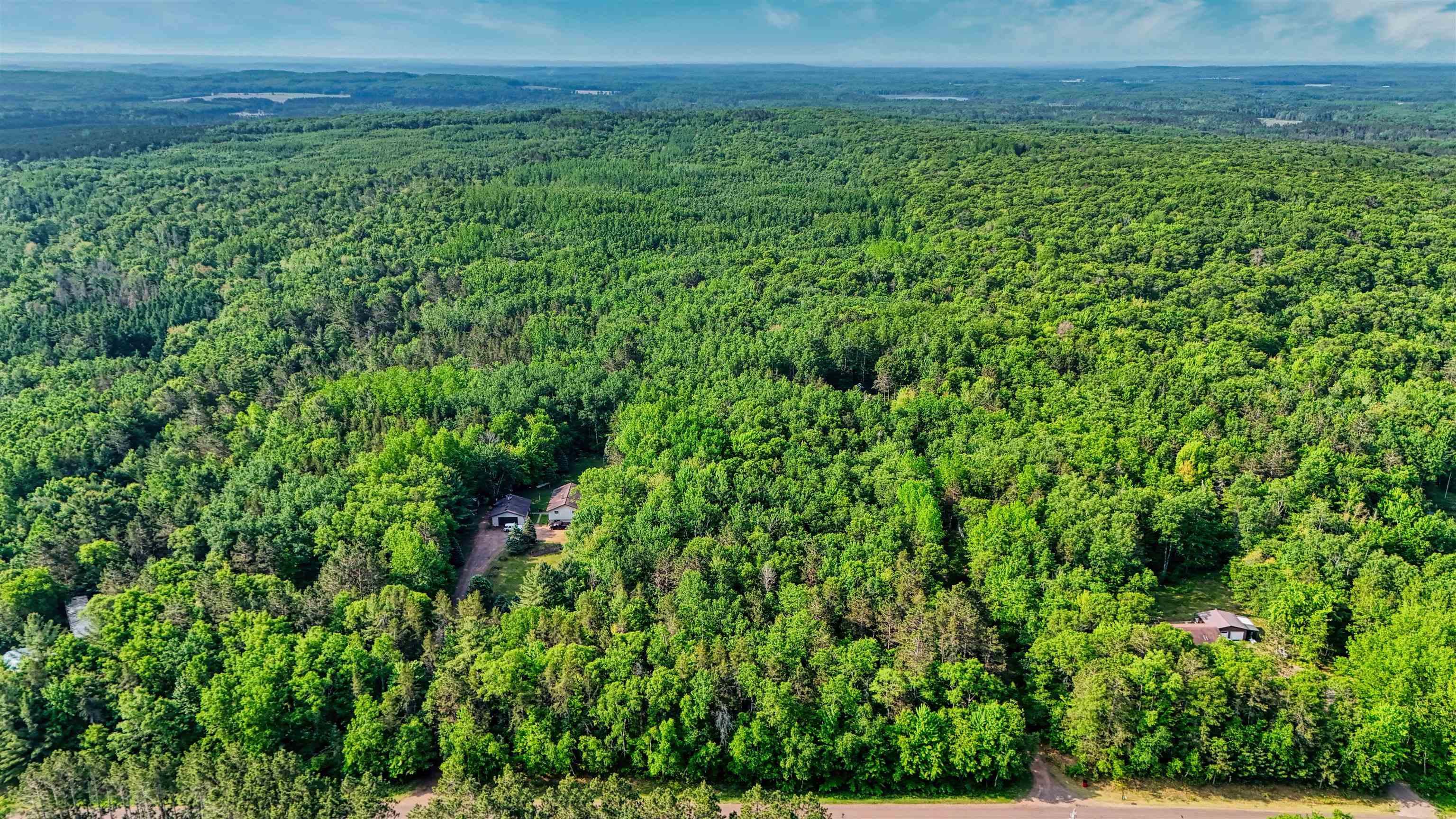 5-acres On Spring Lake Road Trego, WI 54888 - Photo 6 of 16 Aerial view of property and surrounding area featuring a forest