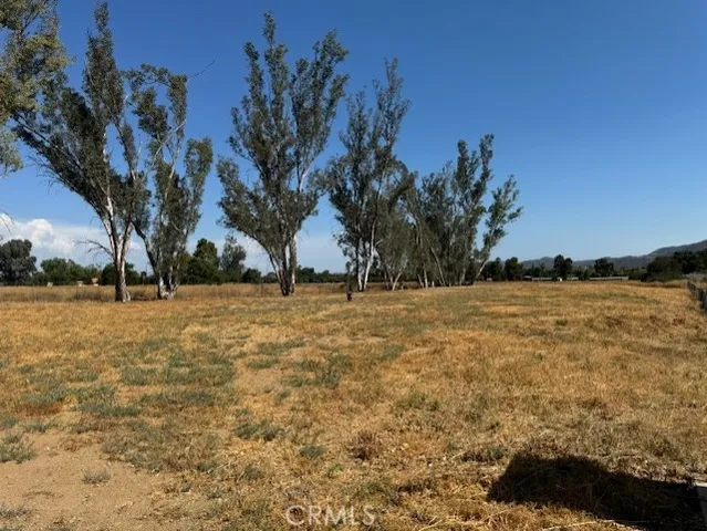 a view of yard covered with snow