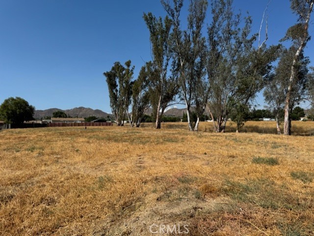 34572 Garrison Street Wildomar, CA 92595 - Photo 3 of 10 a backyard of a house with lots of green space
