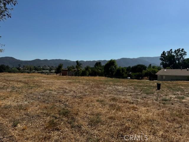 34572 Garrison Street Wildomar, CA 92595 - Photo 7 of 10 a view of lake with mountain