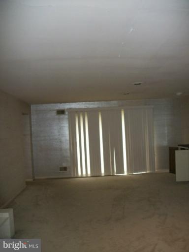4101 Raleigh Road Pikesville, MD 21208 - Photo 14 of 26 a view of an empty room